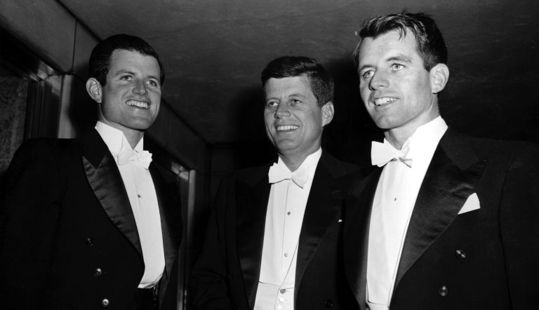Sen. John F. Kennedy, center, D-Mass., and his brothers Edward Kennedy, left, a student at the University of Virginia, and Robert F. Kennedy, chief counsel to the Senate Rackets Committee, attend the annual Gridiron Club dinner in Washington, D.C., on March 15, 1958. 