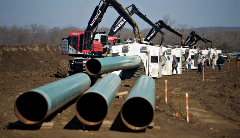 Weld shacks sit over pipe joints during construction of the Gulf Coast Project pipeline in Atoka, Oklahoma, U.S., on Monday, March 11, 2013. 