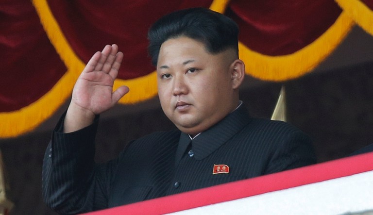North Korean leader Kim Jong Un gestures as he watches a military parade in Pyongyang, North Korea, Saturday, Oct. 10, 2015. North Korea is holding one of its biggest celebrations for the 70th anniversary of its ruling party's creation.