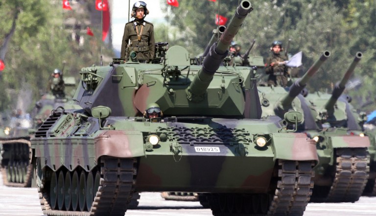 Turkish army's tanks roll during a ceremony on the Victory Day in Ankara, Turkey, in this Aug. 30, 2007 file photo. Turkish warplanes bombed Kurdish rebel targets in northern Iraq early Sunday, Dec. 16, 2007, and artillery units fired shells toward Iraq from the town of Cukurca, where the borders of Turkey, Iran and Iraq meet, Turkey's military said, the first such confirmed attack since the U.S.-led invasion of Iraq.