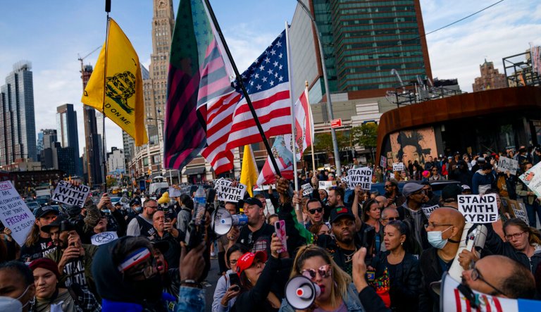 Protesters nearly storm arena and demand unvaccinated Kyrie Irving play