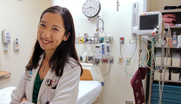In this Aug. 14, 2012 file photo, Dr. Leana Wen stands in the emergency department at Brigham and Women's Hospital in Boston, during her medical residency. On Wednesday, Sept. 12, 2018, Wen, an immigrant from China who has been Baltimore's health commissioner for nearly four years, was named as the new president of Planned Parenthood.