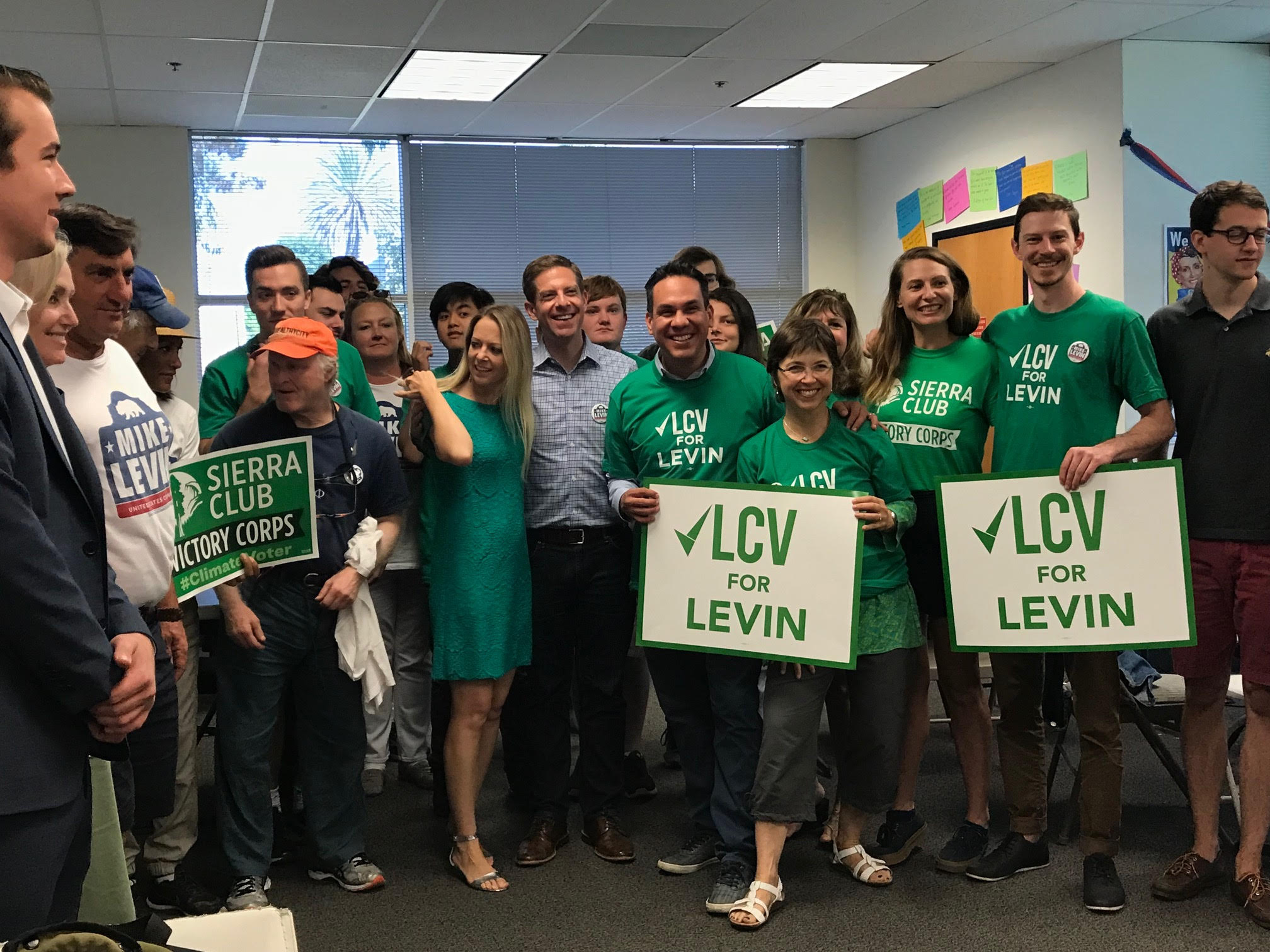 Democrat Mike Levin appears with supporters from environmentalist groups in California.