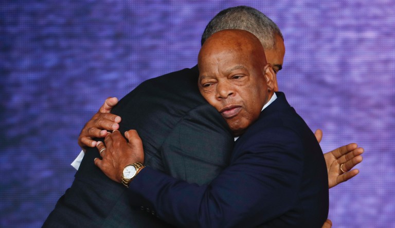 Rep. John Lewis, D-Ga., right, and President Barack Obama embrace at the dedication ceremony for the Smithsonian Museum of African American History and Culture on the National Mall in Washington, Saturday, Sept. 24, 2016. 