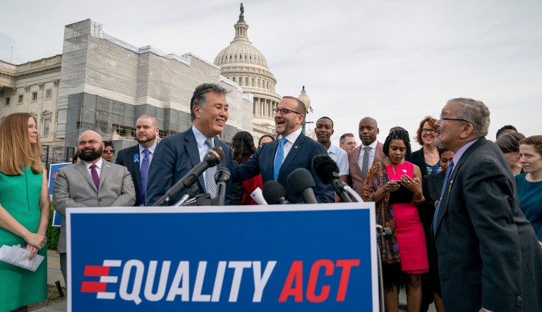 Rep. Mark Takano, D-Calif., left, is greeted by Chad Griffin, president of the Human Rights Campaign, as they and other advocates for LGBTQ rights rally before a vote in the House on the "Equality Act of 2019," sweeping anti-discrimination legislation that would extend civil rights protections to LGBT people by prohibiting discrimination based on sexual orientation or gender identity, at the Capitol in Washington, Friday, May 17, 2019.