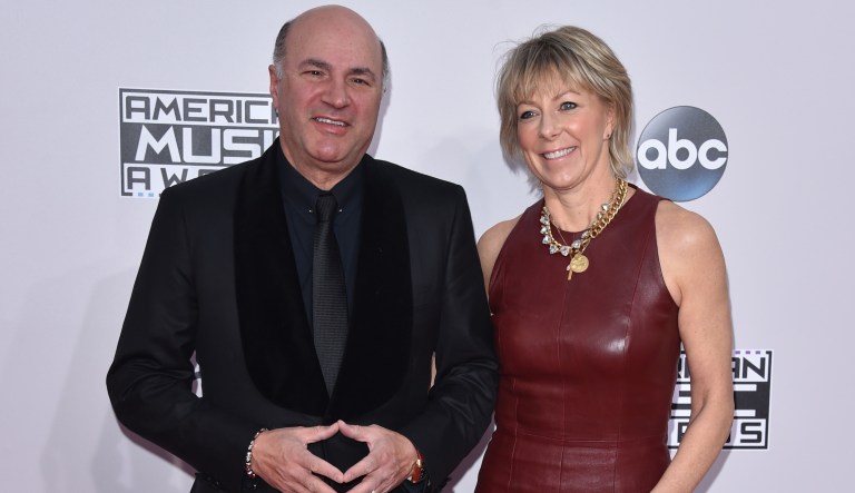 Kevin O'Leary, left, and Linda O'Leary arrive at the 42nd annual American Music Awards at Nokia Theatre L.A. Live on Sunday, Nov. 23, 2014, in Los Angeles. 