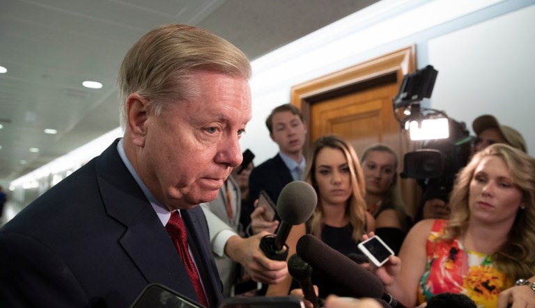 Senate Judiciary Committee Chairman Lindsey Graham, R-S.C., speaks to reporters as he arrives to begin a markup on immigration policy on Capitol Hill in Washington, Thursday, Aug. 1, 2019. The Senate Judiciary Committee is engaged in a heated battle over immigration policy as chairman Lindsey Graham threatens to upend the rules to advance a detention bill that Democrats oppose.  Itâs one last battle, being led Thursday by a top ally of President Donald Trump, before senators break for a long August recess and the start of 2020 campaigning.