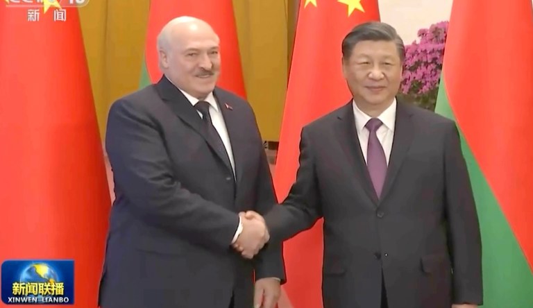 In this image taken from video footage run by China's CCTV, Belarusian President Alexander Lukashenko, left, shakes hands with Chinese President Xi Jinping during a welcome ceremony held at the Great Hall of the People, in Beijing, on Wednesday, March 1, 2023.
