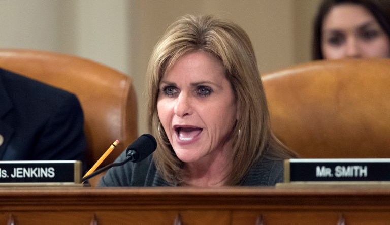 Rep. Lynn Jenkins, R-Kansas, joined at left by Rep. Erik Paulsen, R-Minn., participates in the House Ways and Means Committee markup process of the GOP's far-reaching tax overhaul, on Capitol Hill in Washington, Monday, Nov. 6, 2017.