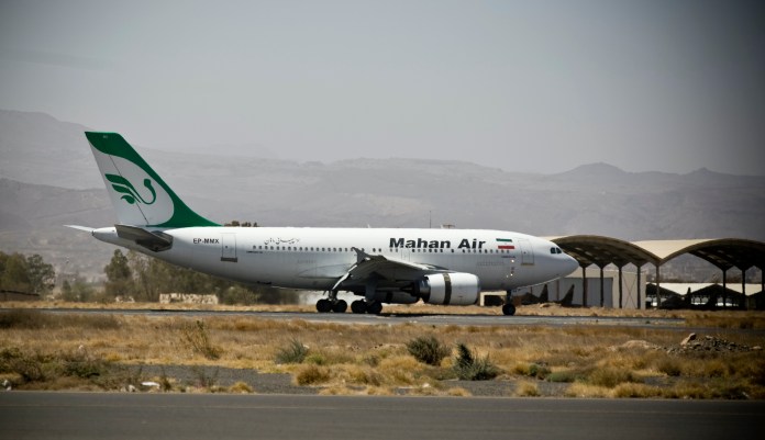 A plane from the Iranian private airline, Mahan Air lands the international airport in Sanaa, Yemen, Sunday, March 1, 2015.