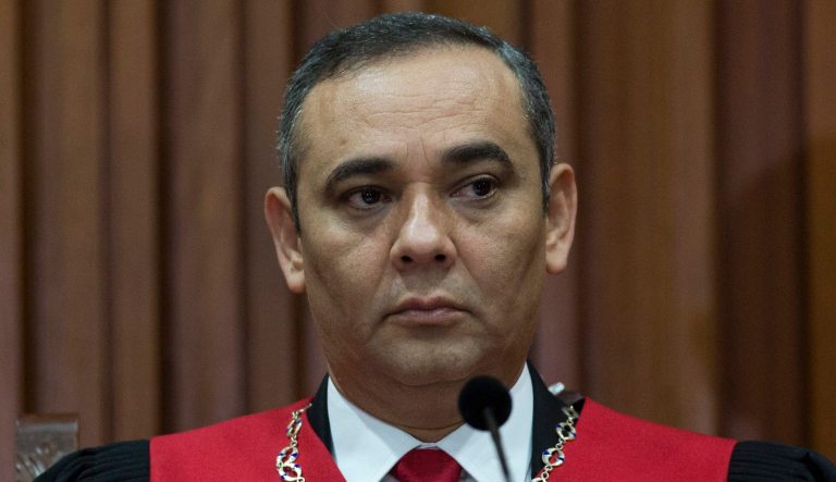 Venezuela's Supreme Court President Maikel Moreno, during a meeting with the press at the Supreme Court in Caracas, Venezuela, Saturday, April 1, 2017. Venezuela's president and Supreme Court backed down Saturday from an audacious move to strip congress of its legislative powers that had sparked widespread charges that the South American country was no longer a democracy.