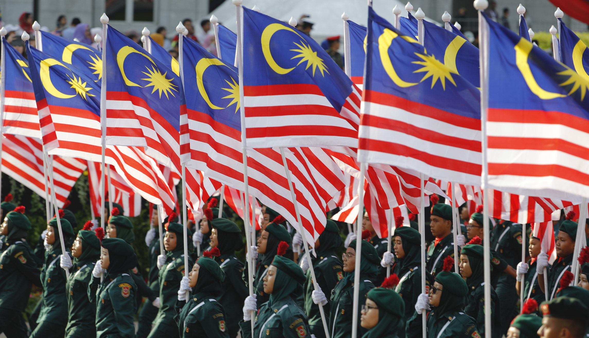 Malaysian court sentences five gay men to jail, caning, and fines