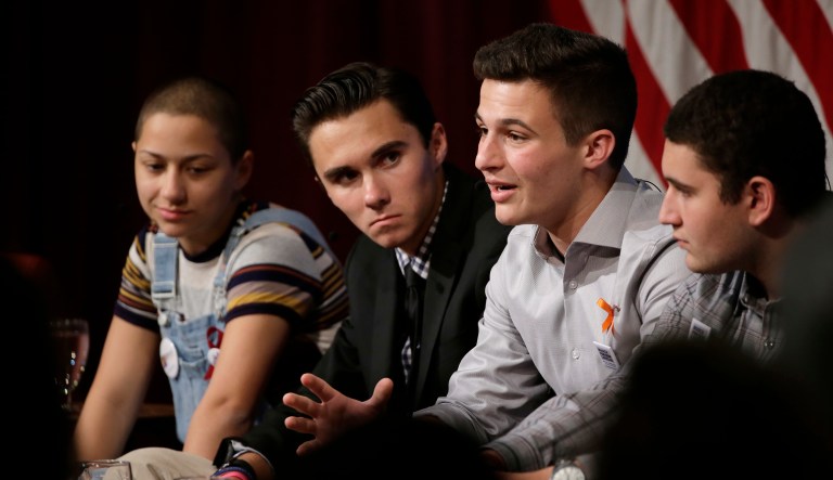 Marjory Stoneman Douglas High School students, and mass shooting survivors, from the left, Emma Gonzalez, David Hogg, Cameron Kasky, and Alex Wind, participate in a panel discussion about guns, Tuesday, March 20, 2018, at Harvard Kennedy School's Institute of Politics, in Cambridge, Mass.