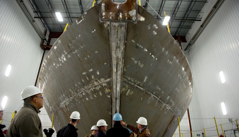 A hull section of a U.S. Navy Littoral Combat Ship (LCS) sits in a paint booth during a facility tour at Marinette Marine Corp., in Marinette, Wisconsin, U.S., on Monday, Feb. 11, 2013. Marinette Marine Corp. is the ship builder producing the LCS with a team lead by Lockheed Martin Corp. The vessels are intended to patrol coastal water for mine-sweeping, anti-submarine warfare and operations against smaller vessels.