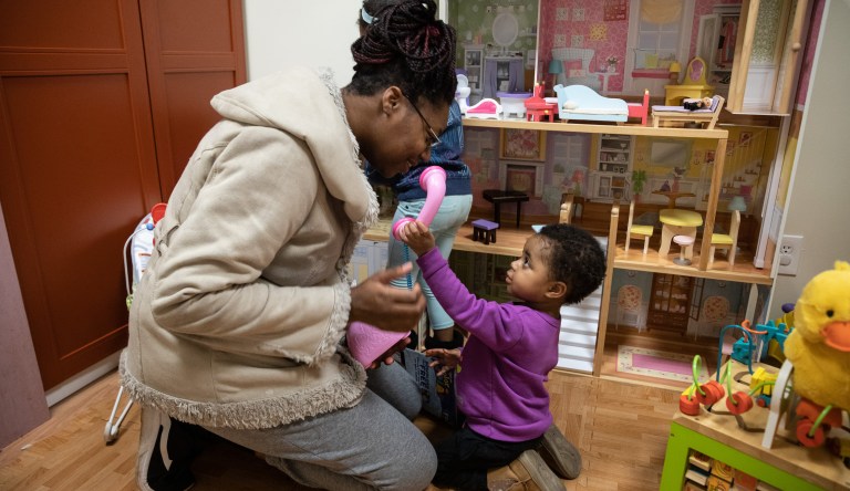 Tara and her daughter Azura in the playroom at Mary's Shelter. 
