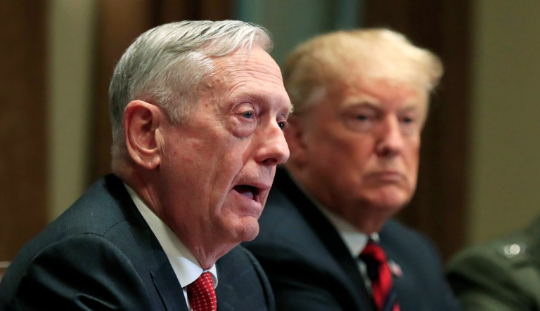 From left, Defense Secretary Jim Mattis with President Donald Trump, Chairman of the Joint Chiefs of Staff Gen. Joseph Dunford and Marine Corps Commandant Gen. Robert Neller, speaks during a briefing with senior military leaders in the Cabinet Room at the White House in Washington, Tuesday, Oct. 23, 2018.