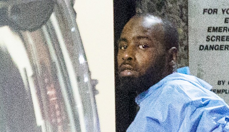 Police take shooting suspect, Maurice Hill, into custody after an hourslong standoff with police, that wounded several police officers, in Philadelphia early Thursday, Aug. 15, 2019.