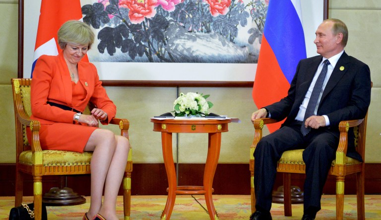Russian President Vladimir Putin, right, listens to British Prime Minister Theresa May during a bilateral meeting in Hangzhou, China, Sunday, Sept. 4, 2016, ahead of the G20 Leaders Summit.