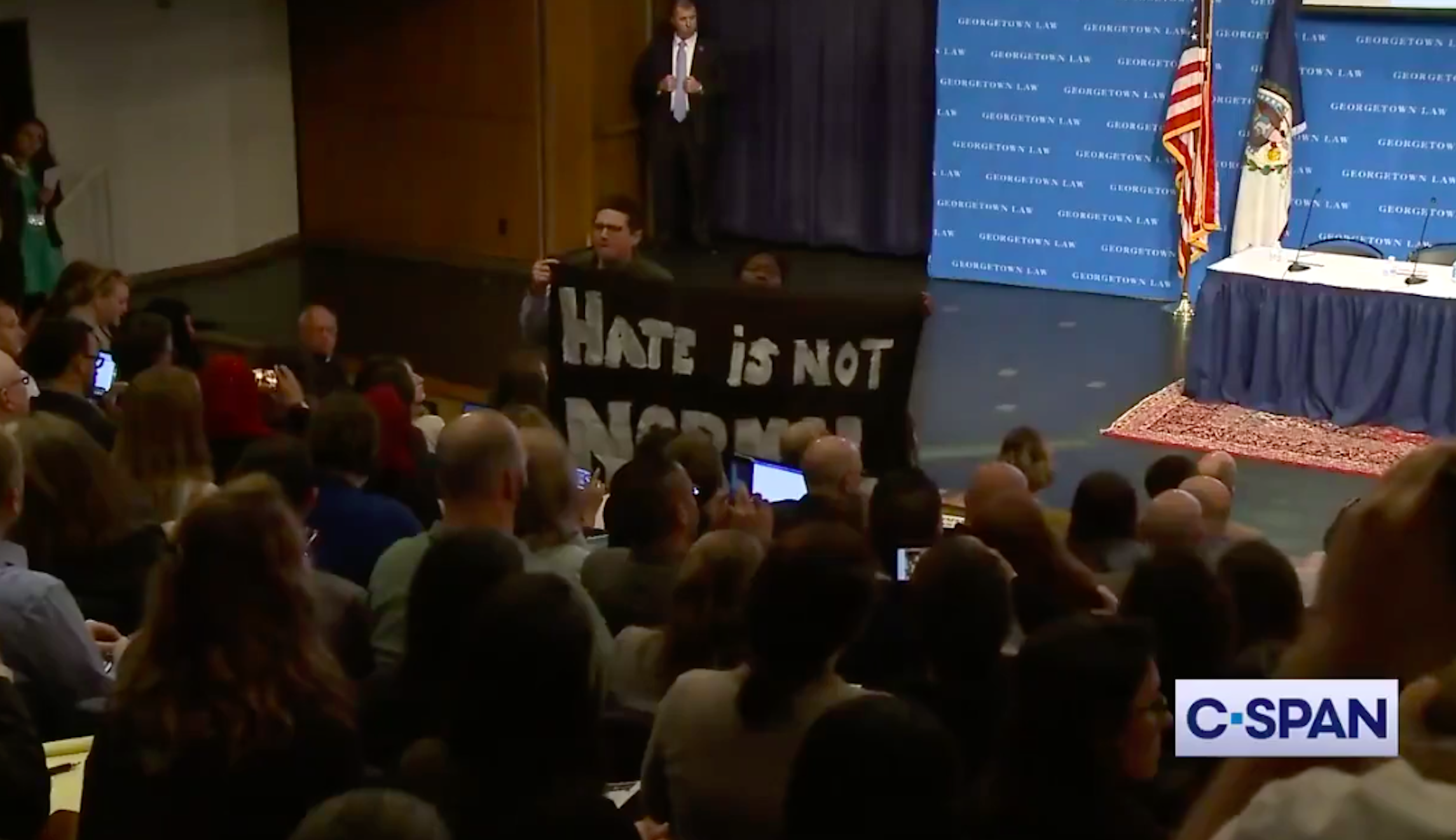 Acting homeland security secretary walks out after protesters repeatedly disrupt remarks