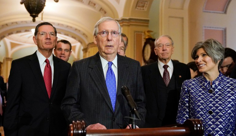Senate Majority Leader Mitch McConnell of Ky., center, speaks to media after a meeting in his office at the Capitol in Washington, Wednesday, Nov. 14, 2018. With McConnell are from left, Sen. John Barrasso, R-Wyo., Sen. Todd Young, R-Ind., Sen. Roy Blunt, R-Mo., Sen. Chuck Grassley, R-Iowa, and Sen. Joni Ernst, R-Iowa, right.