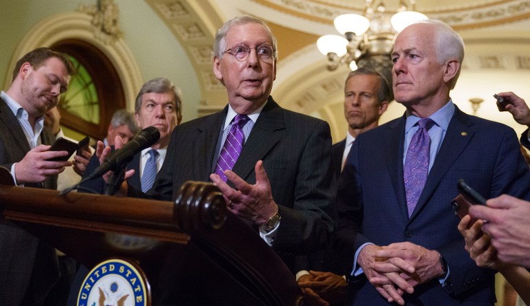 Senate Majority Leader Mitch McConnell, R-Ky., joined by Sen. Roy Blunt, R-Mo., left, Sen. John Thune, R-S.D., second from right, and Majority Whip John Cornyn, R-Texas, right, speaks with reporters about the confirmation for President Donald Trump's Supreme Court nominee, Brett Kavanaugh, following a closed-door GOP policy meeting, at the Capitol in Washington, Tuesday, Sept. 25, 2018.