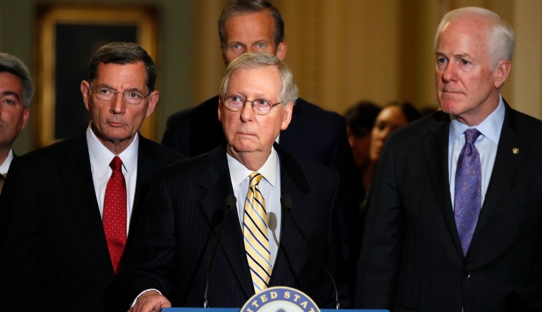 Senate Majority Leader Mitch McConnell of Ky., listens to a question from a reporter with Sen. John Barrasso, R-Wyo., Sen. John Thune, R-S.D., and Senate Majority Whip Sen. John Cornyn, R-Texas, during a news conference of Senate Republican leadership, Tuesday, Sept. 12, 2017, on Capitol Hill in Washington.