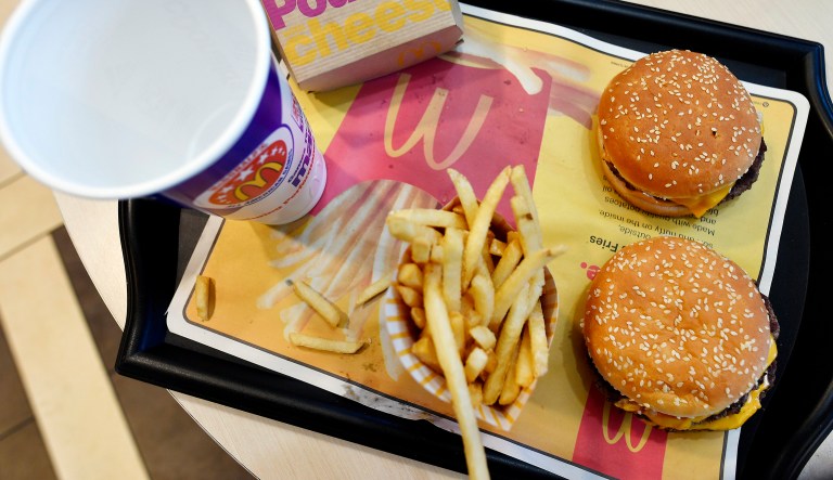 A McDonald's Quarter Pounder, top right, and Double Quarter Pound burger are shown with fresh beef Tuesday, March 6, 2018, in Atlanta.