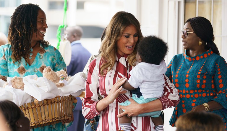 First lady Melania Trump holds a baby as she visits Greater Accra Regional Hospital in Accra, Ghana, Tuesday, Oct. 2, 2018. The first lady is visiting Africa on her first big solo international trip, aiming to make child well-being the focus of a five-day, four-country tour.