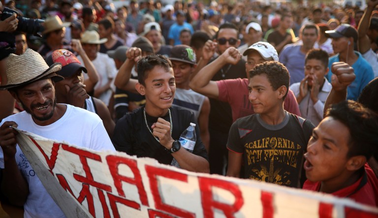 Central American migrants traveling with the annual Stations of the Cross caravan march for migrants' rights and protest the policies of U.S. President Donald Trump and Honduran President Juan Orlando Hernandez, in Matias Romero, Oaxaca State, Mexico, Tuesday, April 3, 2018. Bogged down by logistical problems, large numbers of children and fears about people getting sick, the caravan was always meant to draw attention to the plight of migrants and was never equipped to march all the way to the U.S. border.