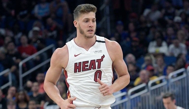 Miami Heat forward Meyers Leonard (0) runs up the court after a play during the first half of an NBA basketball game against the Orlando Magic Friday, Jan. 3, 2020, in Orlando, Fla.