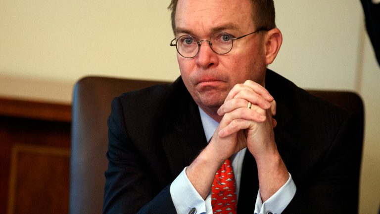 White House chief of staff Mick Mulvaney listens as President Donald Trump speaks during a cabinet meeting at the White House, Wednesday, Jan. 2, 2019, in Washington. 