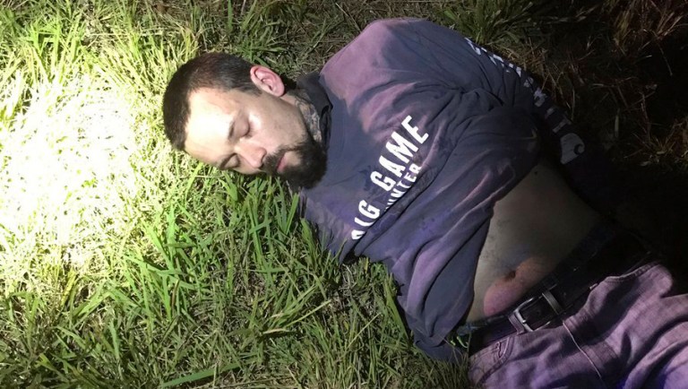 This photo provided by the Limestone County Sheriff's Office posted on Twitter shows Mickey Paulk under arrest Thursday, June 27, 2019, in Killen, Ala. Authorities had been seeking Paulk on multiple felony warrants unrelated to the squirrel named âDeeznutz,â made infamous after police said they were warned about a meth-fueled, trained attack squirrel. 