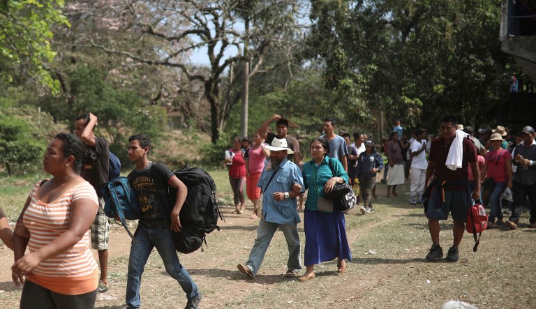 Central American migrants arrive to a sports center during the annual Migrant Stations of the Cross caravan or "Via crucis," organized by the "Pueblo Sin Fronteras" activist group, as the group makes a few-days stop in Matias Romero, Oaxaca state, Mexico, Monday, April 2, 2018.  The organized portions of the caravans usually don't proceed much farther north than the Gulf coast state of Veracruz, while some migrants, moving as individuals or in smaller groups, often take buses or trucks from there to the U.S. border.