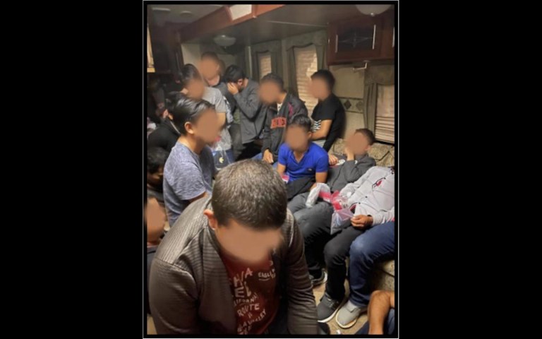 Seventy-four migrants, including two smugglers, found crammed in Texas trailers