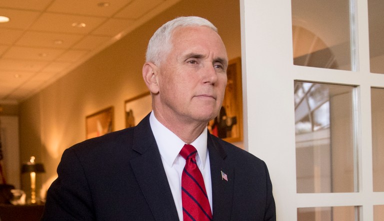 Vice President Mike Pence arrives for a news conference between President Donald Trump and Japanese Prime Minister Shinzo Abe in the Rose Garden at the White House Thursday, June 7, 2018, in Washington. Abe is expected to make sure Trump doesn't overlook Japan's security and other concerns at next week's U.S.-North Korea summit.