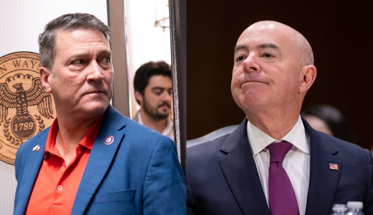 Rep. Ronny Jackson (R-TX), left, and Homeland Security Secretary Alejandro Mayorkas, right.