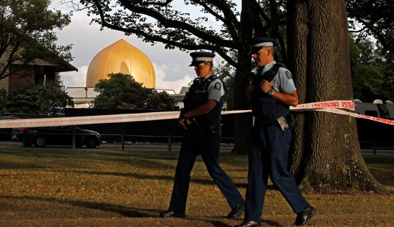 Police officers patrol at a park outside the Al Noor mosque in Christchurch, New Zealand, Wednesday, March 20, 2019.