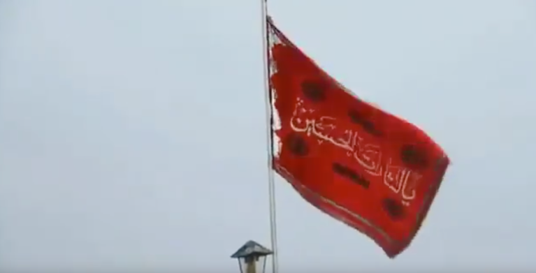 WATCH: Iran unveils red flag of revenge against America at mosque