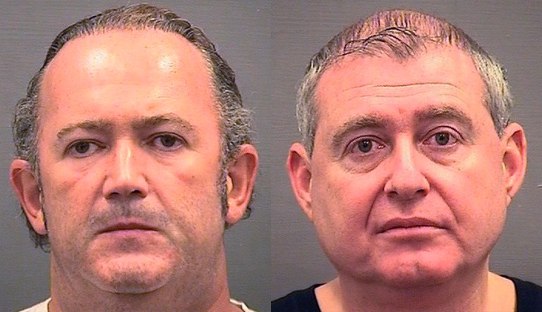 This combination of Wednesday, Oct. 9, 2019, photos provided by the Alexandria Sheriffâs Office shows booking photos of Lev Parnas, left, and Igor Fruman.
