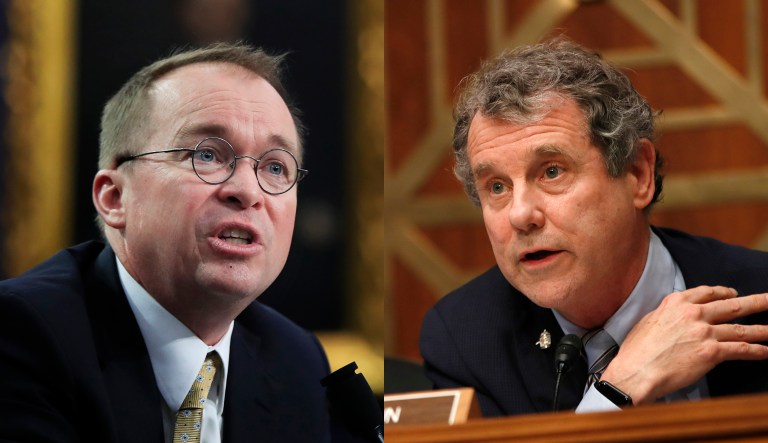 Consumer Financial Protection Bureau acting director Mick Mulvaney (left) and Sen. Sherrod Brown, D-Ohio, are pictured.