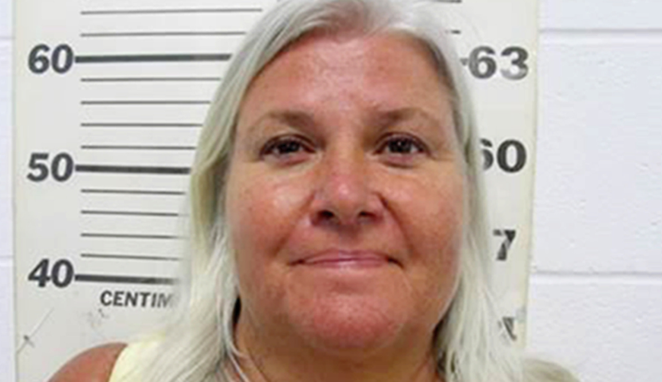 ‘Fugitive grandma’ pleads guilty to killing woman who looked like her