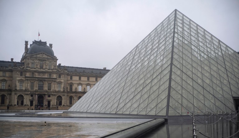 A view of the Louvre museum, in Paris, France, Sunday, March 1, 2020. The spreading coronavirus epidemic shut down France's Louvre Museum on Sunday, with workers who guard its trove of artworks fearful of being contaminated by the museum's flow of visitors from around the world.