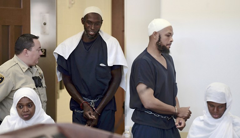 Defendants, from left, Jany Leveille, Lucas Morton, Siraj Wahhaj and Subbannah Wahhaj enter district court in Taos, N.M., for a detention hearing, Monday, Aug. 13, 2018.