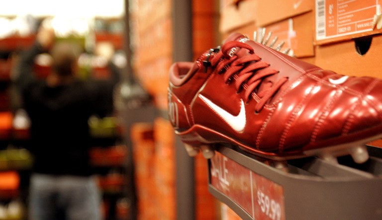 A shopper looks for shoes at a Nike Factory Store in Anthem, Ariz.