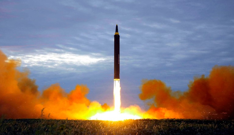 FILE - This Aug. 29, 2017 file photo distributed on Aug. 30, 2017 by the North Korean government shows what was said to be the test launch of a Hwasong-12 intermediate range missile in Pyongyang, North Korea. An unknown number of nuclear warheads. Stockpiles of plutonium and uranium. ICBMs. Weapons factories - and the scientists who work at them. The list of what it would take for the âcomplete denuclearizationâ of North Korea is long. North Korea has said itâs willing to deal away its entire nuclear arsenal if the United States provides it with a reliable security assurance and other benefits.