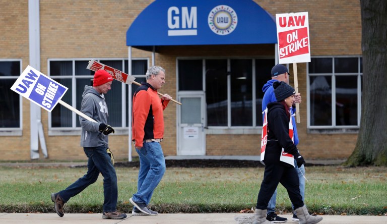 General Motors employees picket outside the General Motors Fabrication Division, Wednesday, Oct. 16, 2019, in Parma, Ohio. General Motors CEO Mary Barra joined negotiators at the bargaining table, an indication that a deal may be near to end a monthlong strike by the United Auto Workers union that has paralyzed the company's factories.