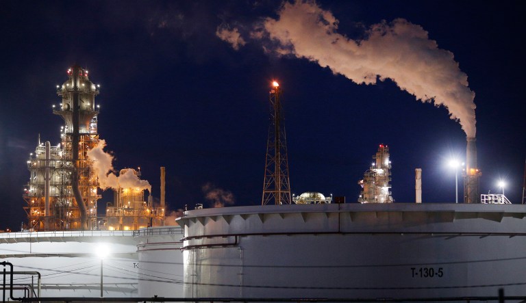 Emissions rise from the Valero Energy Corp. St. Charles Refinery at night in Norco, Louisiana, U.S., on Thursday, Feb. 8, 2018. U.S. refiners exported staggering amounts of diesel and gasoline last year, hitting records in both categories while continuing to eye more opportunities to expand.