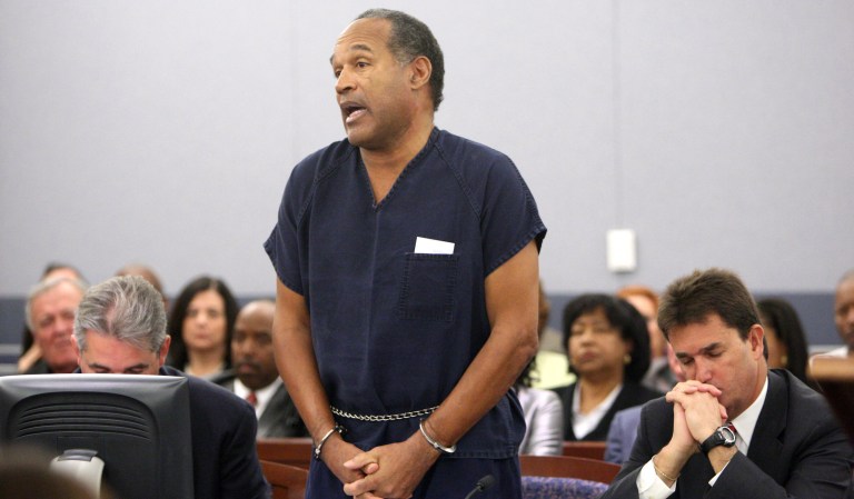 O.J. Simpson speaks during his sentencing hearing at the Clark County Regional Justice Center in Las Vegas, Friday, Dec. 5, 2008. Sitting right to Simpson is his lawyer Yale Galanter. 