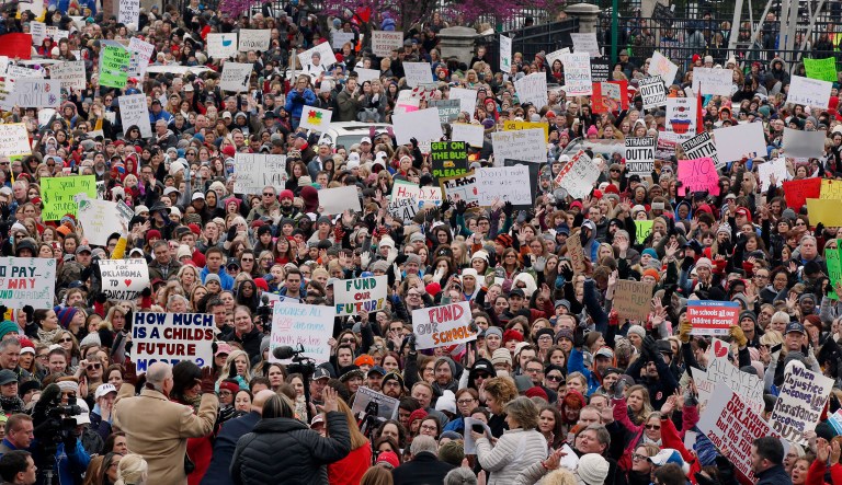 The crowd cheers during a teacher rally at the state Capitol in Oklahoma City, Monday, April 2, 2018. Teachers were holding separate protests in Oklahoma and Kentucky on Monday to voice dissatisfaction with issues like pay and pensions.