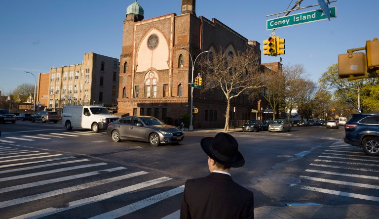 A Jewish boy walks to a yeshiva in the Brooklyn borough of New York.